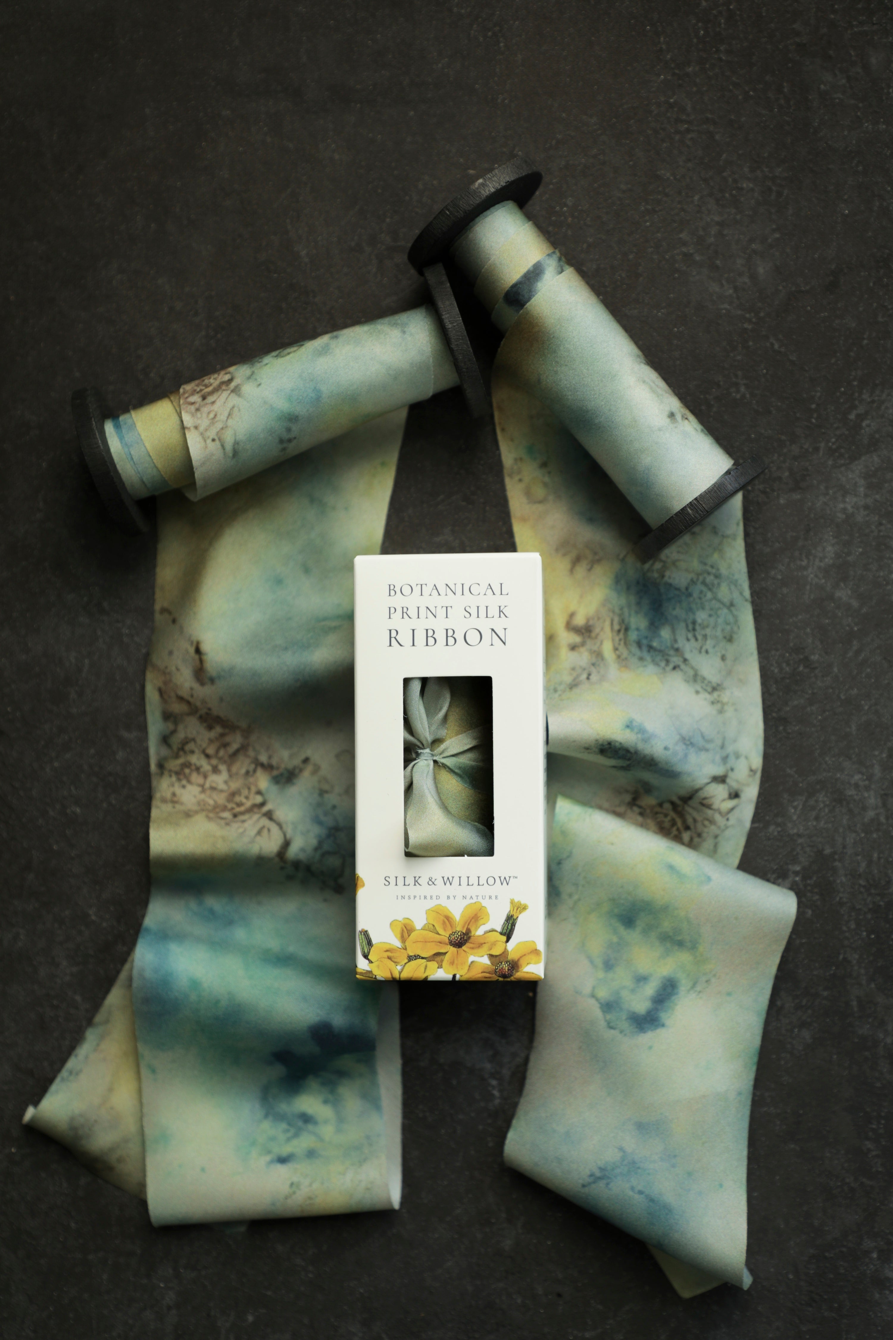 Eco-friendly silk ribbons with nature-inspired patterns, perfect for unique gift wrapping and tying market bouquets, crafted from sustainable materials