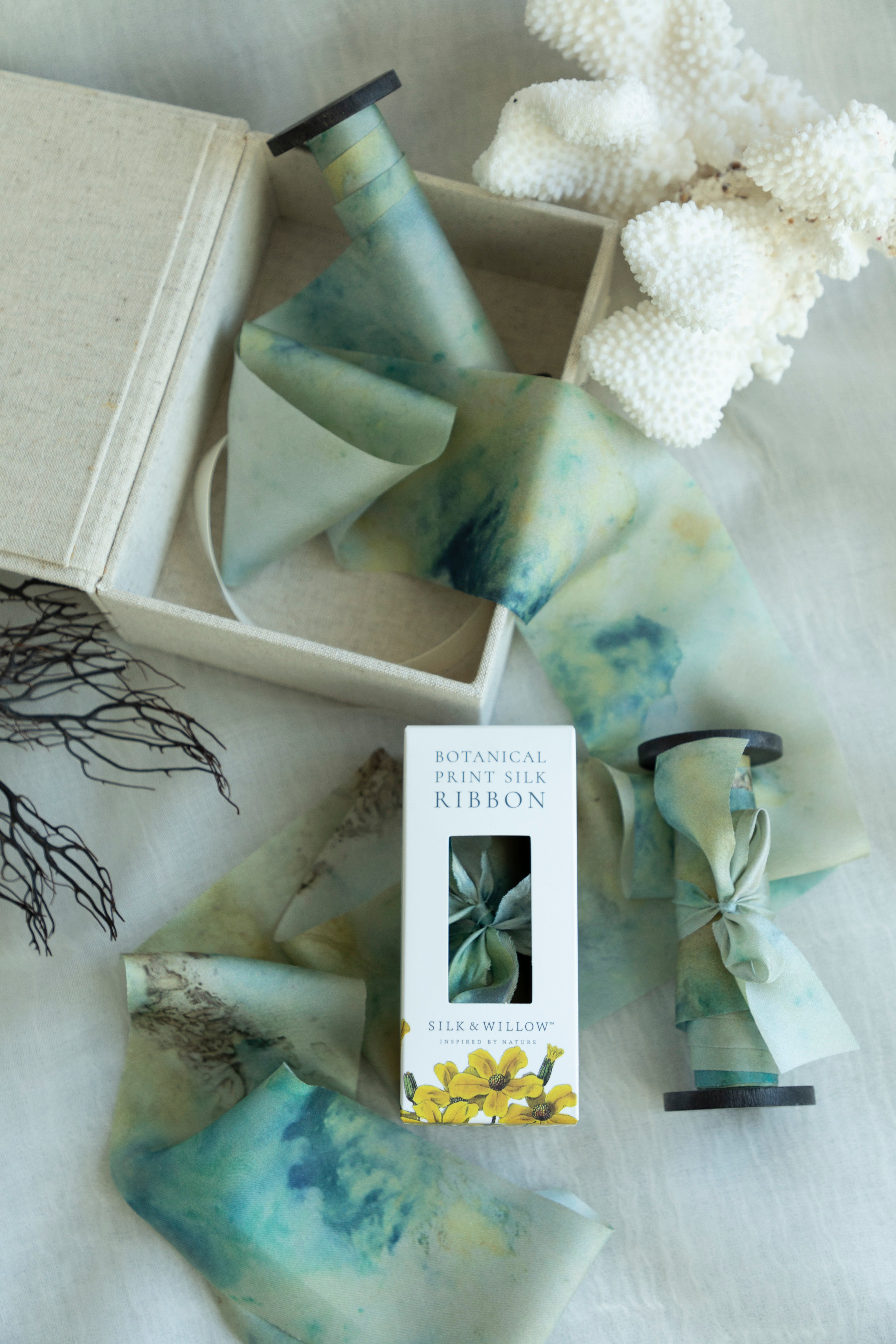 Eco-friendly silk ribbons with nature-inspired patterns, perfect for unique gift wrapping and tying market bouquets, crafted from sustainable materials