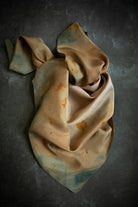 sustainable silk scarf. hand dyed by renown textile artist shellie pomeroy. Eco-prints featuring flowers and indigo