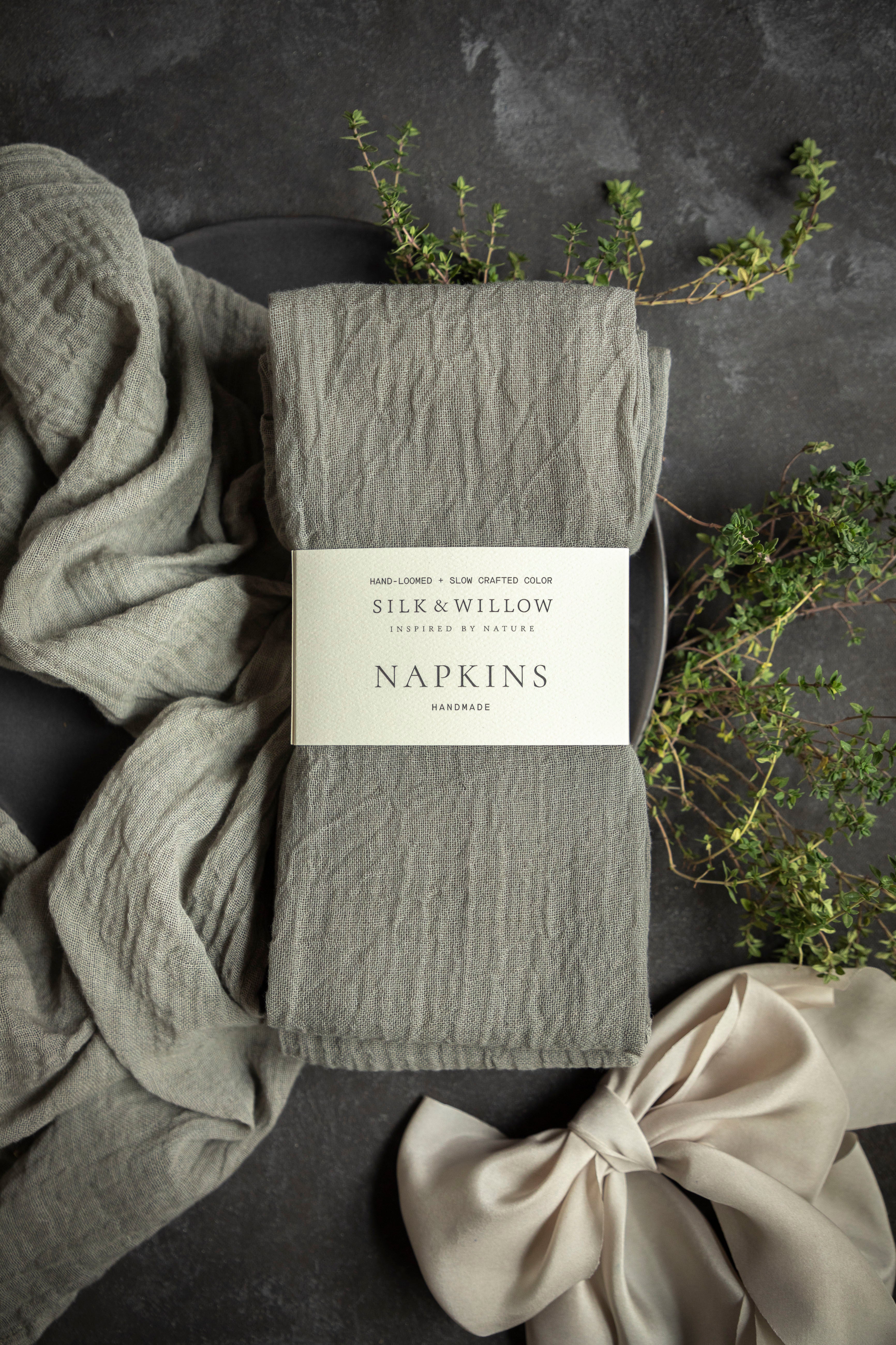 Eco-conscious wedding decor featuring gray cotton napkins. Hand-loomed and plant dyed cotton napkins beautifully packaged perfect hotess gift